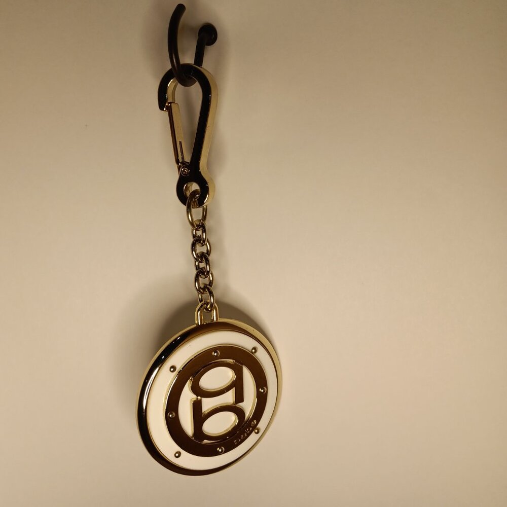 Vintage BEBE White on Gold Keychain Fob Hard to find